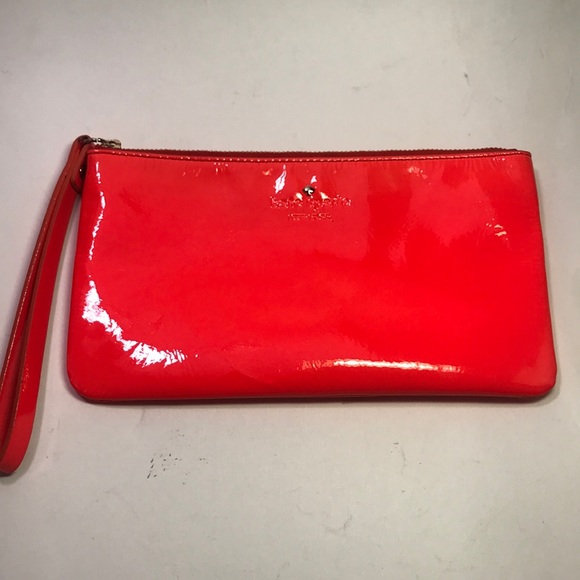 kate spade Handbags - Kate Spade wristlet, neon orange